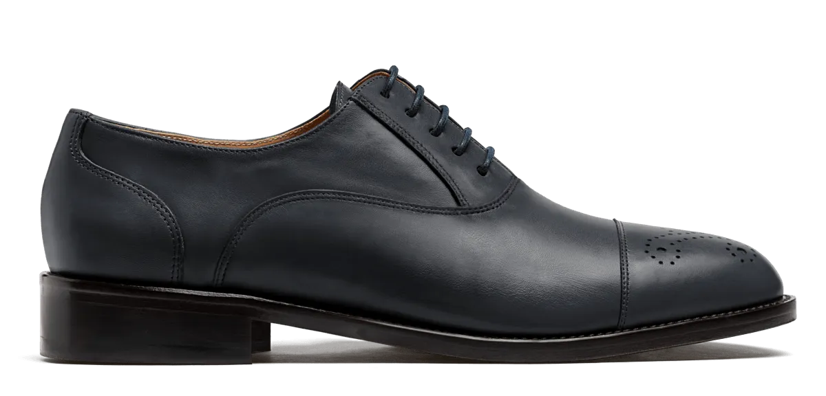 Cap toe Oxfords in blue leather