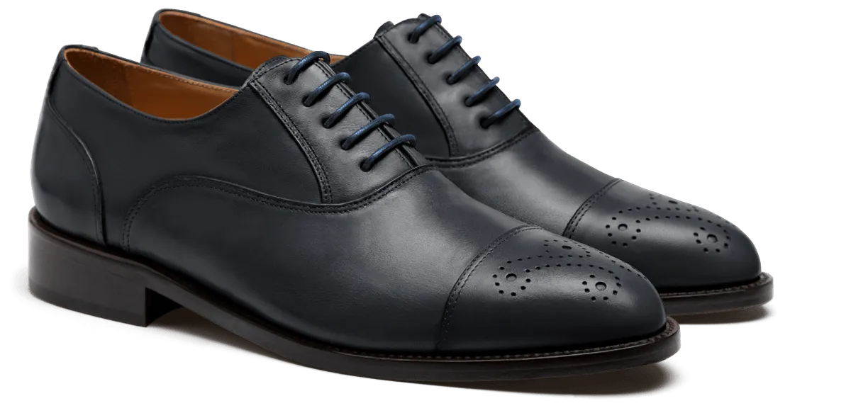 Cap toe Oxfords in blue leather