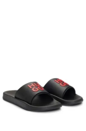 Slides with logo-branded straps